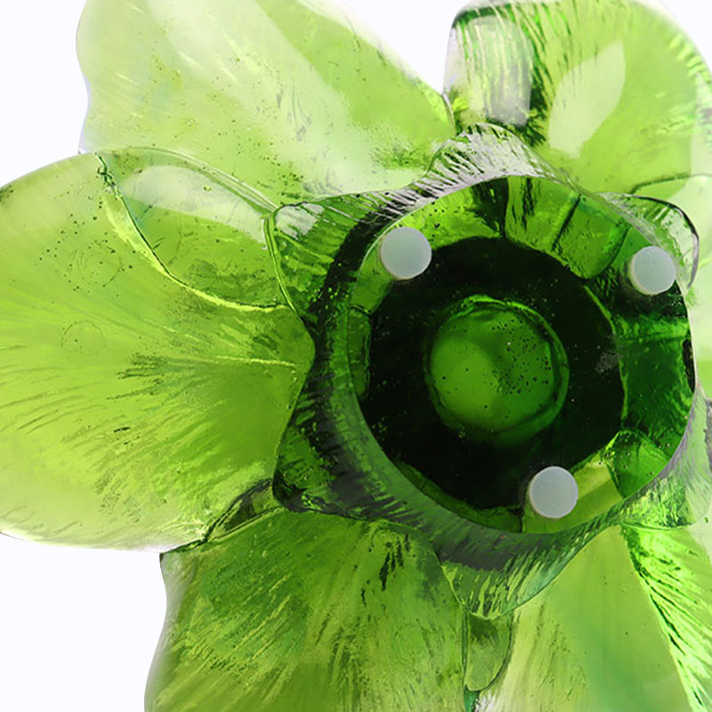 Terälehden muotoinen lasikynttilänjalka