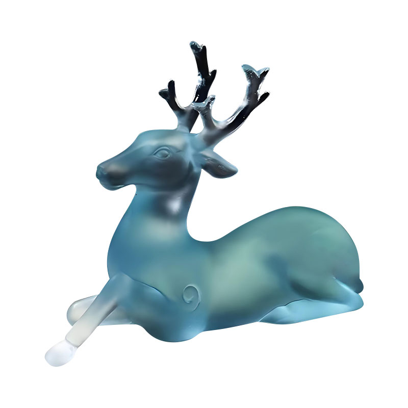 Sininen lasinen hirven muotoinen harjasteline