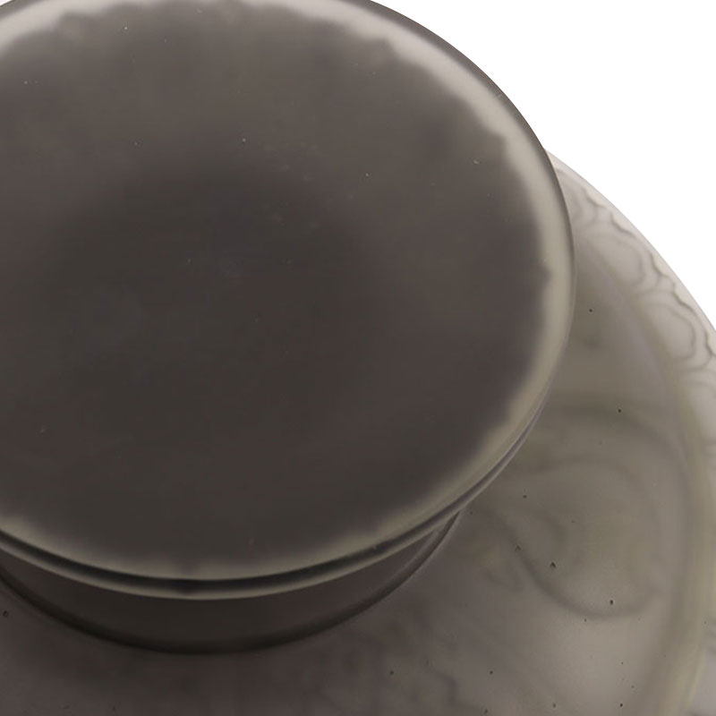 Harmaa lasite hedelmäkulho