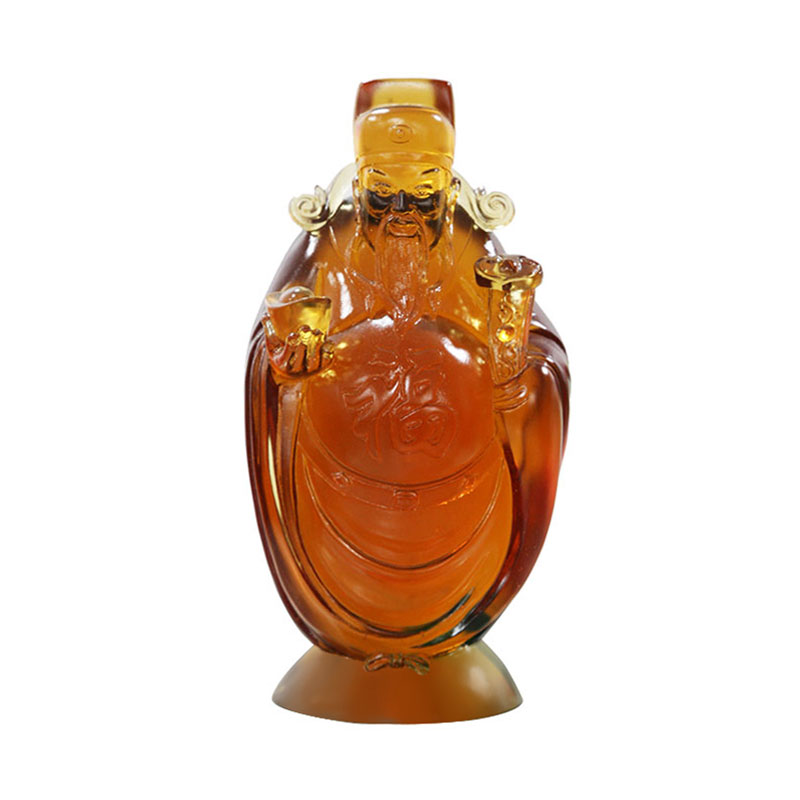 Rikkaiden koristeiden lasijumala